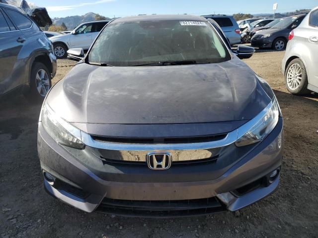 Photo 4 VIN: 2HGFC1F95HH639867 - HONDA CIVIC TOUR 