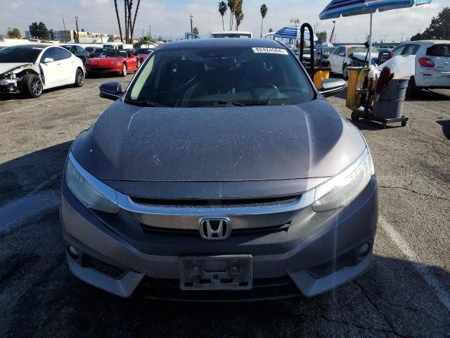 Photo 4 VIN: 2HGFC1F99GH631530 - HONDA CIVIC TOUR 