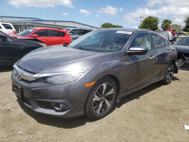 Photo 1 VIN: 2HGFC1F9XGH630693 - HONDA CIVIC TOUR 