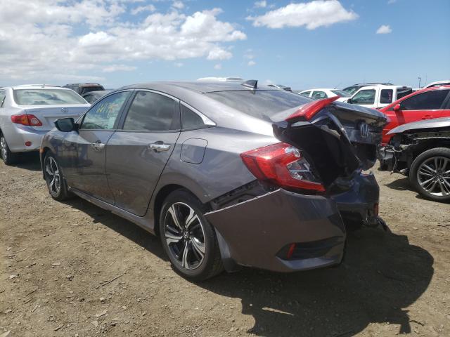 Photo 2 VIN: 2HGFC1F9XGH630693 - HONDA CIVIC TOUR 