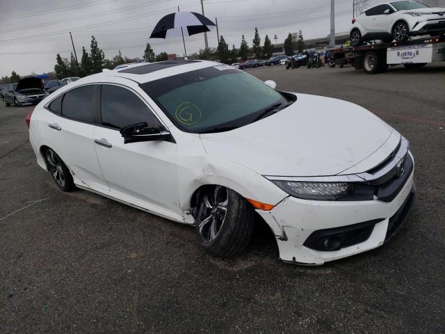 Photo 3 VIN: 2HGFC1F9XHH632994 - HONDA CIVIC TOUR 