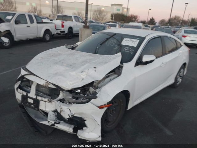 Photo 1 VIN: 2HGFC2F50JH586701 - HONDA CIVIC 