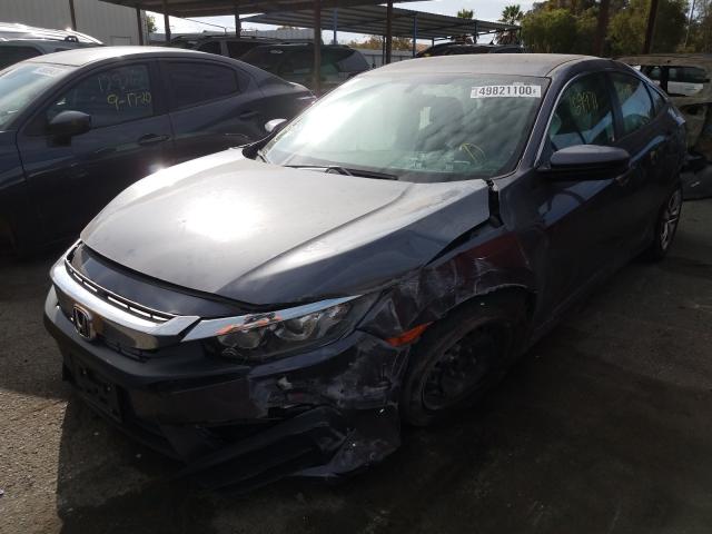 Photo 1 VIN: 2HGFC2F52JH525611 - HONDA CIVIC LX 