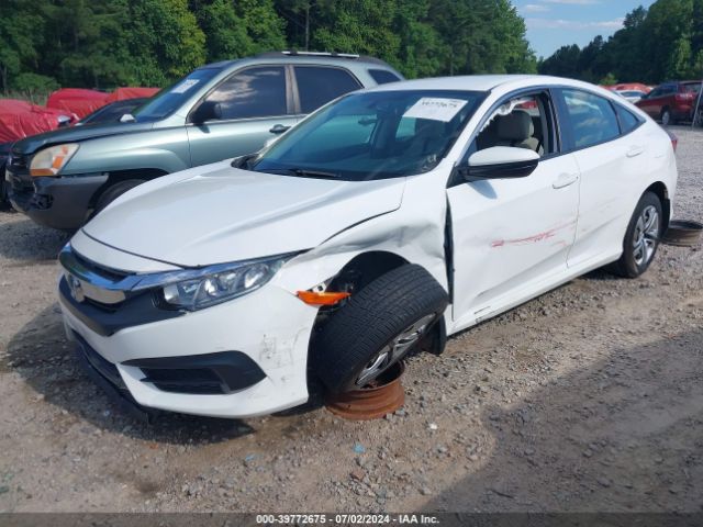 Photo 1 VIN: 2HGFC2F52JH566563 - HONDA CIVIC 