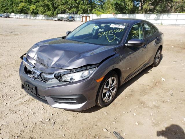 Photo 1 VIN: 2HGFC2F52JH568197 - HONDA CIVIC LX 