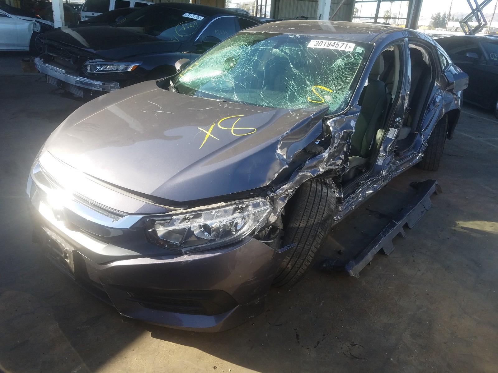 Photo 1 VIN: 2HGFC2F52JH592046 - HONDA CIVIC LX 