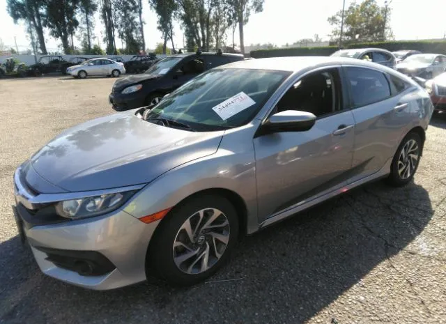 Photo 1 VIN: 2HGFC2F54GH523397 - HONDA CIVIC SEDAN 