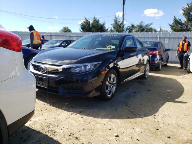 Photo 1 VIN: 2HGFC2F54GH543004 - HONDA CIVIC LX 