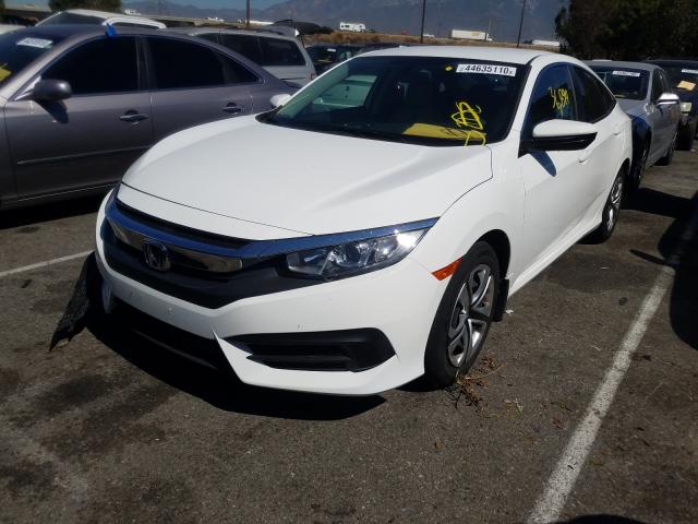 Photo 1 VIN: 2HGFC2F54GH557436 - HONDA CIVIC LX 