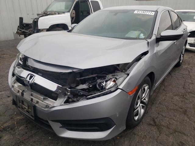 Photo 1 VIN: 2HGFC2F54GH563141 - HONDA CIVIC LX 