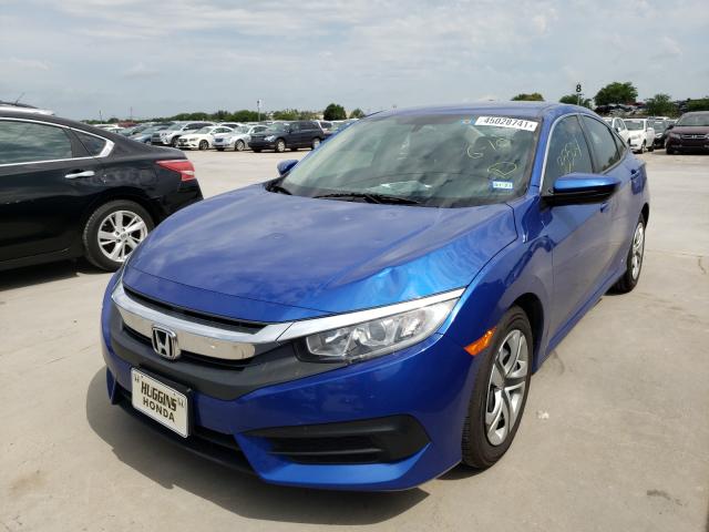 Photo 1 VIN: 2HGFC2F54JH555595 - HONDA CIVIC LX 