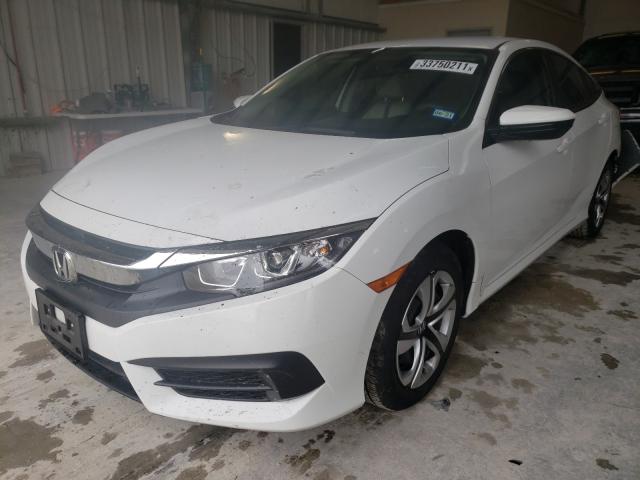 Photo 1 VIN: 2HGFC2F54JH568556 - HONDA CIVIC LX 