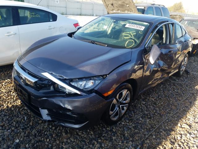 Photo 1 VIN: 2HGFC2F54JH598883 - HONDA CIVIC LX 