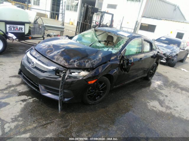 Photo 1 VIN: 2HGFC2F55GH529970 - HONDA CIVIC 