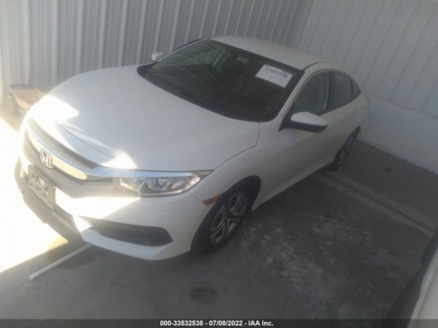 Photo 1 VIN: 2HGFC2F55JH575595 - HONDA CIVIC SEDAN 