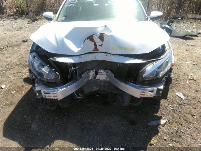 Photo 9 VIN: 2HGFC2F56JH597461 - HONDA CIVIC SEDAN 