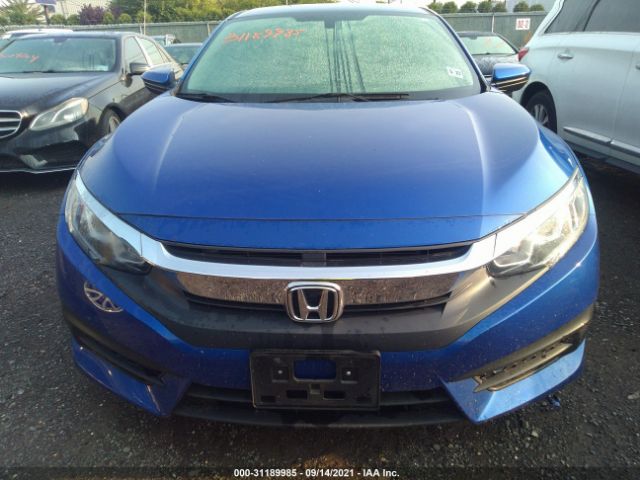 Photo 5 VIN: 2HGFC2F57JH557051 - HONDA CIVIC SEDAN 