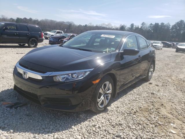 Photo 1 VIN: 2HGFC2F57JH559320 - HONDA CIVIC LX 