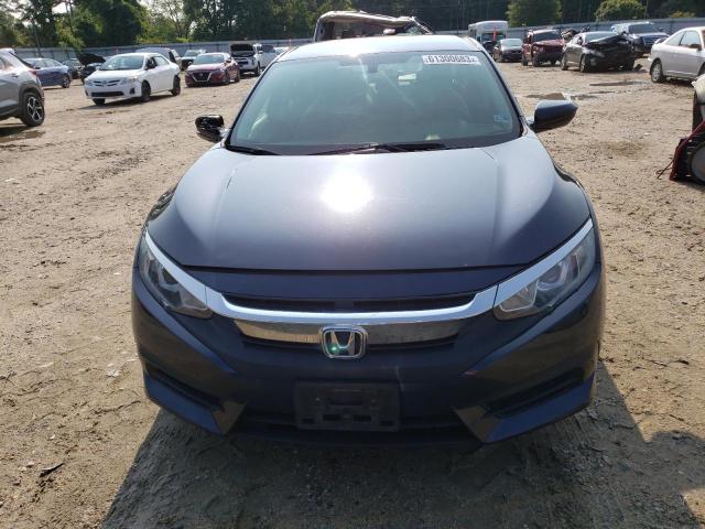 Photo 4 VIN: 2HGFC2F57JH562315 - HONDA CIVIC LX 