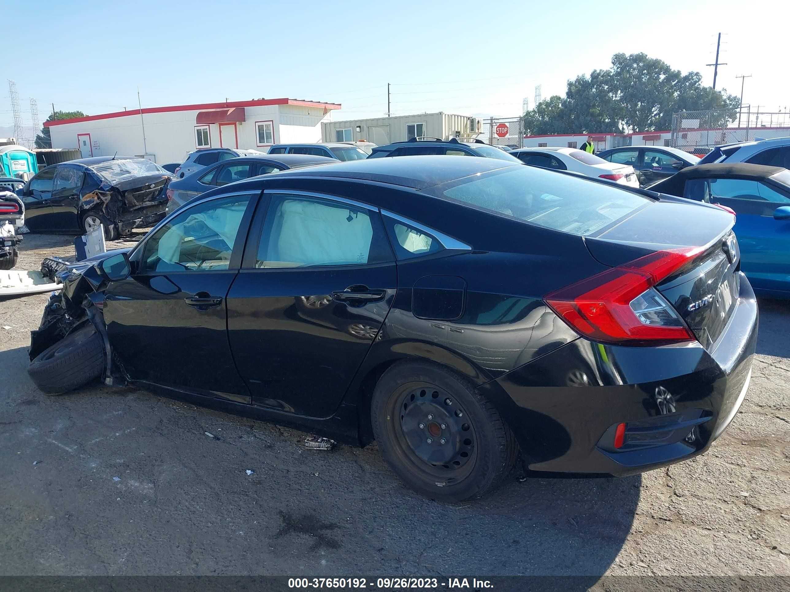 Photo 14 VIN: 2HGFC2F57JH562721 - HONDA CIVIC 