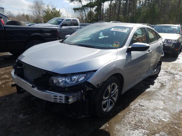 Photo 1 VIN: 2HGFC2F57JH602117 - HONDA CIVIC LX 