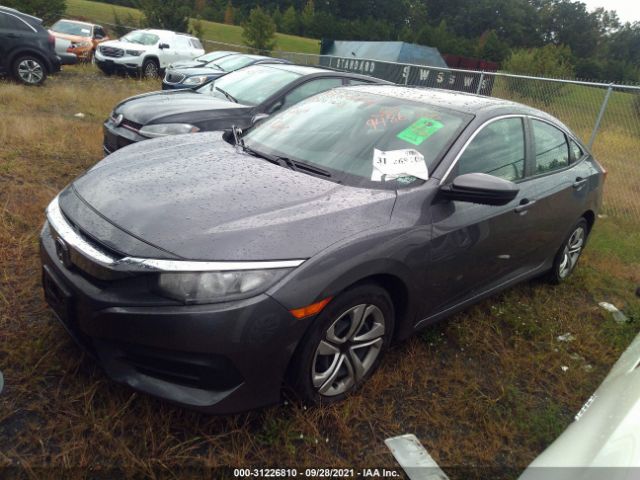 Photo 1 VIN: 2HGFC2F57JH609486 - HONDA CIVIC SEDAN 