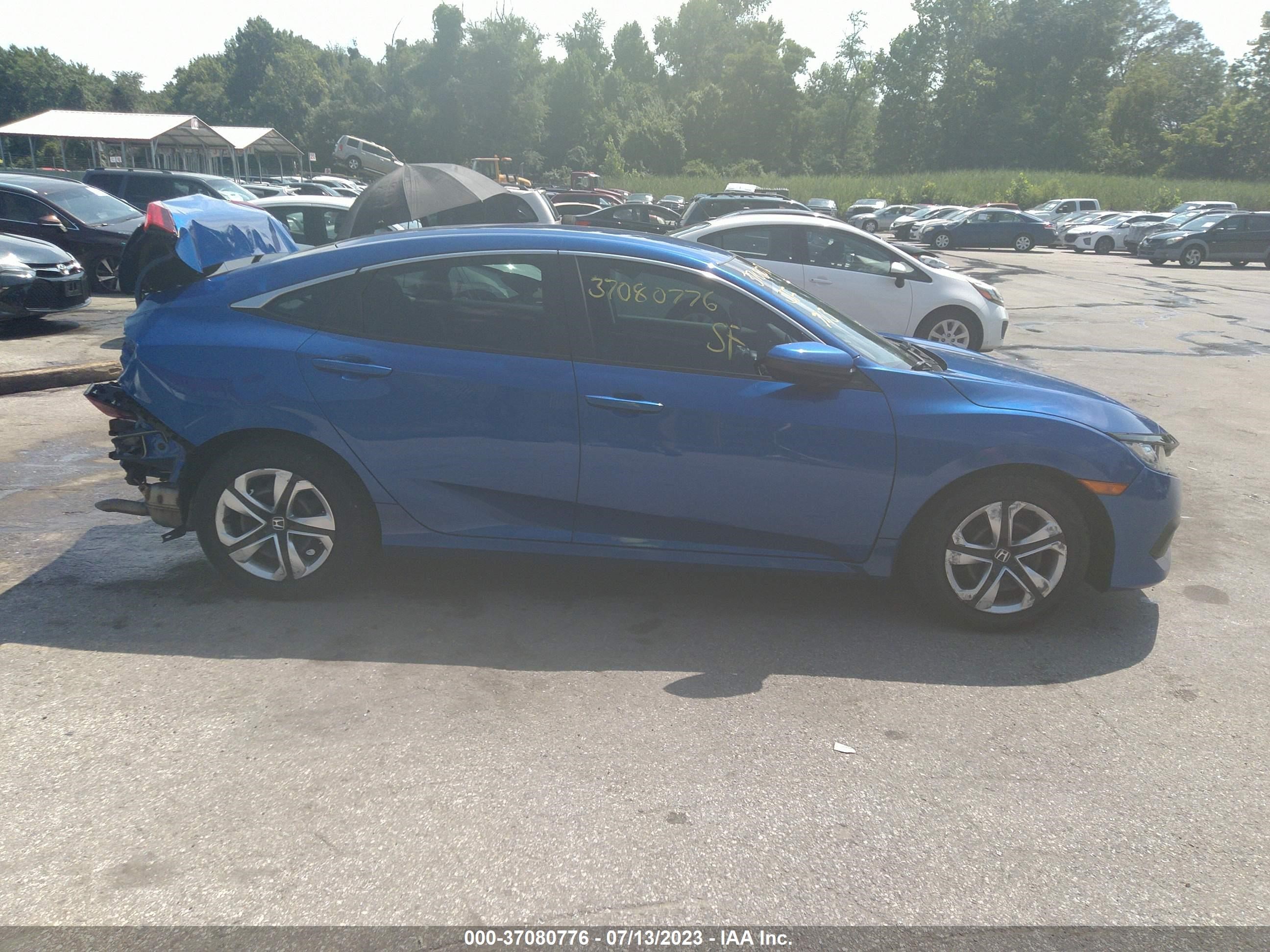 Photo 13 VIN: 2HGFC2F58JH551727 - HONDA CIVIC 