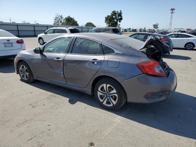 Photo 1 VIN: 2HGFC2F58JH568026 - HONDA CIVIC LX 