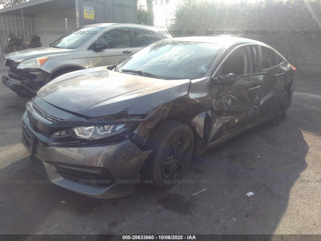 Photo 1 VIN: 2HGFC2F58JH570875 - HONDA CIVIC SEDAN 