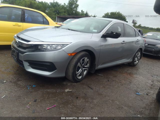 Photo 1 VIN: 2HGFC2F58JH605625 - HONDA CIVIC SEDAN 