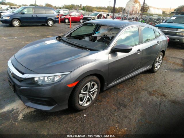 Photo 1 VIN: 2HGFC2F58JH606029 - HONDA CIVIC SEDAN 