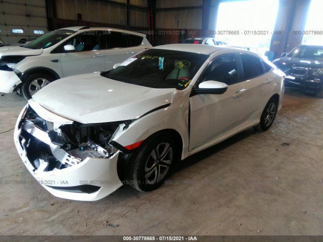 Photo 1 VIN: 2HGFC2F58JH608010 - HONDA CIVIC SEDAN 