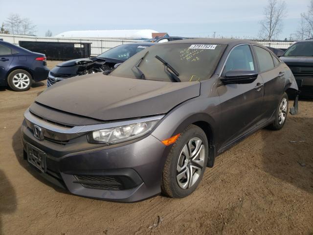 Photo 1 VIN: 2HGFC2F59GH562065 - HONDA CIVIC LX 