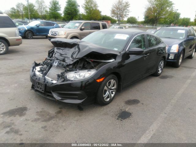 Photo 1 VIN: 2HGFC2F59JH608310 - HONDA CIVIC SEDAN 