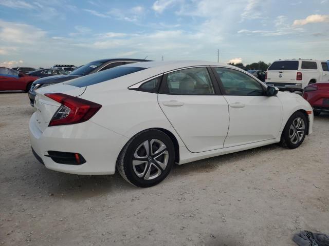 Photo 2 VIN: 2HGFC2F5XGH505891 - HONDA CIVIC LX 