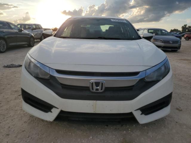 Photo 4 VIN: 2HGFC2F5XGH505891 - HONDA CIVIC LX 