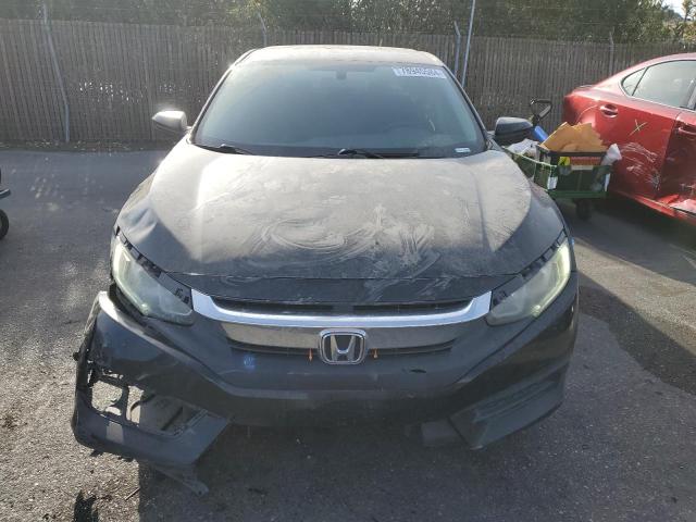 Photo 4 VIN: 2HGFC2F5XGH530869 - HONDA CIVIC LX 