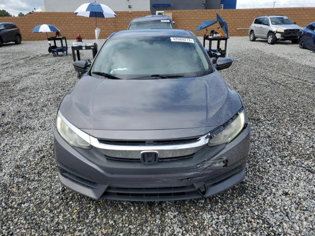 Photo 4 VIN: 2HGFC2F5XGH533030 - HONDA CIVIC LX 