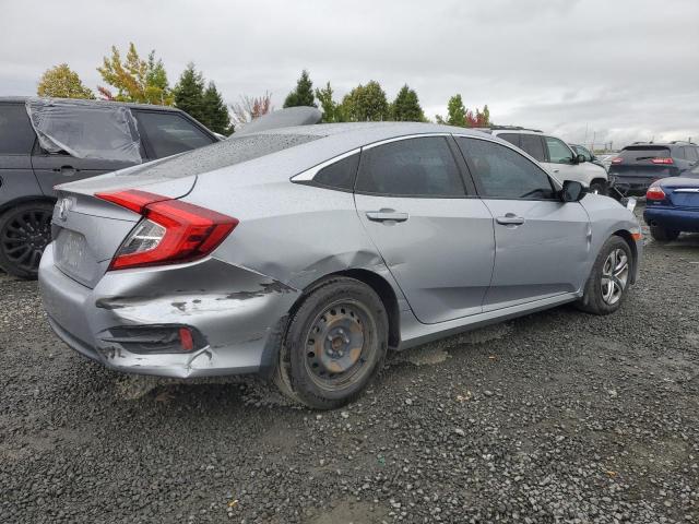 Photo 2 VIN: 2HGFC2F5XGH545999 - HONDA CIVIC LX 