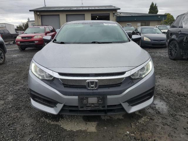 Photo 4 VIN: 2HGFC2F5XGH545999 - HONDA CIVIC LX 