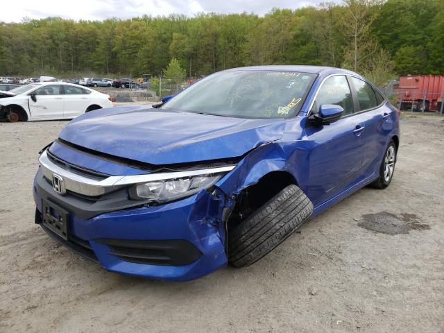 Photo 1 VIN: 2HGFC2F5XGH556873 - HONDA CIVIC LX 