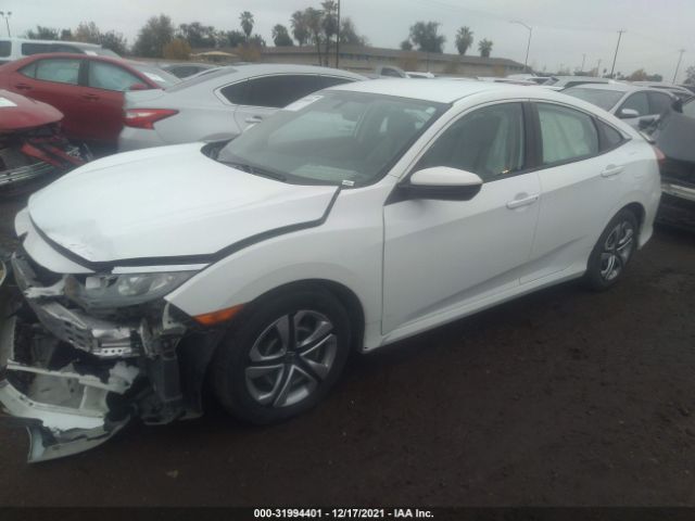 Photo 1 VIN: 2HGFC2F5XGH567999 - HONDA CIVIC SEDAN 