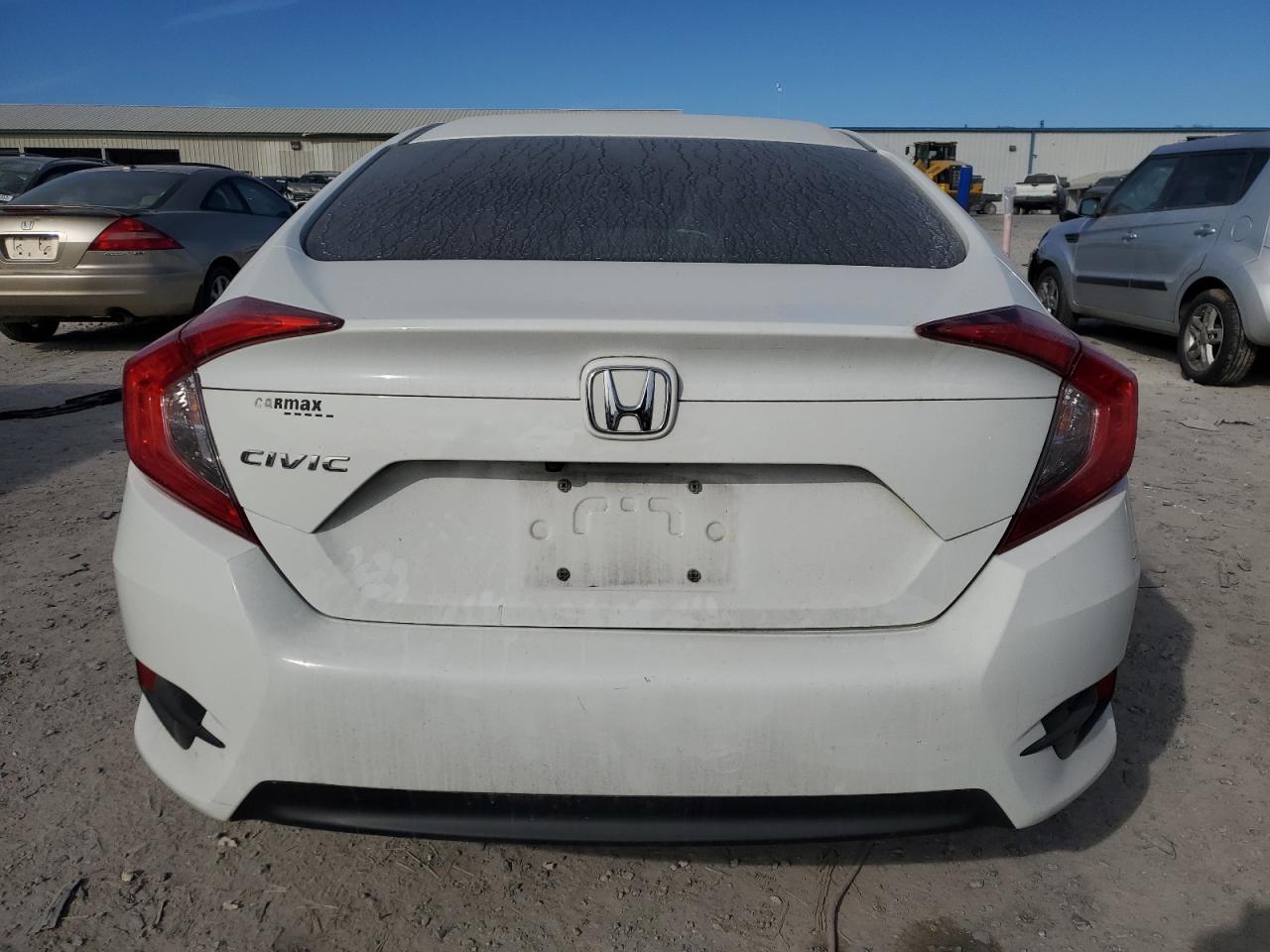 Photo 5 VIN: 2HGFC2F5XGH570062 - HONDA CIVIC 