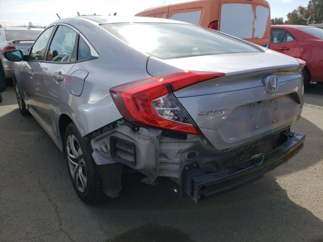 Photo 2 VIN: 2HGFC2F5XGH570143 - HONDA CIVIC LX 