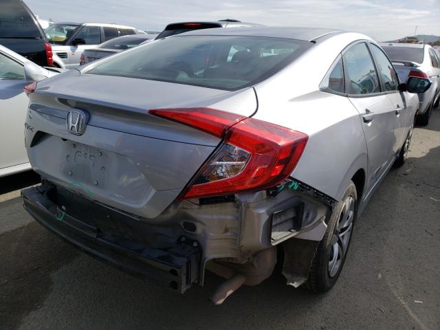 Photo 3 VIN: 2HGFC2F5XGH570143 - HONDA CIVIC LX 