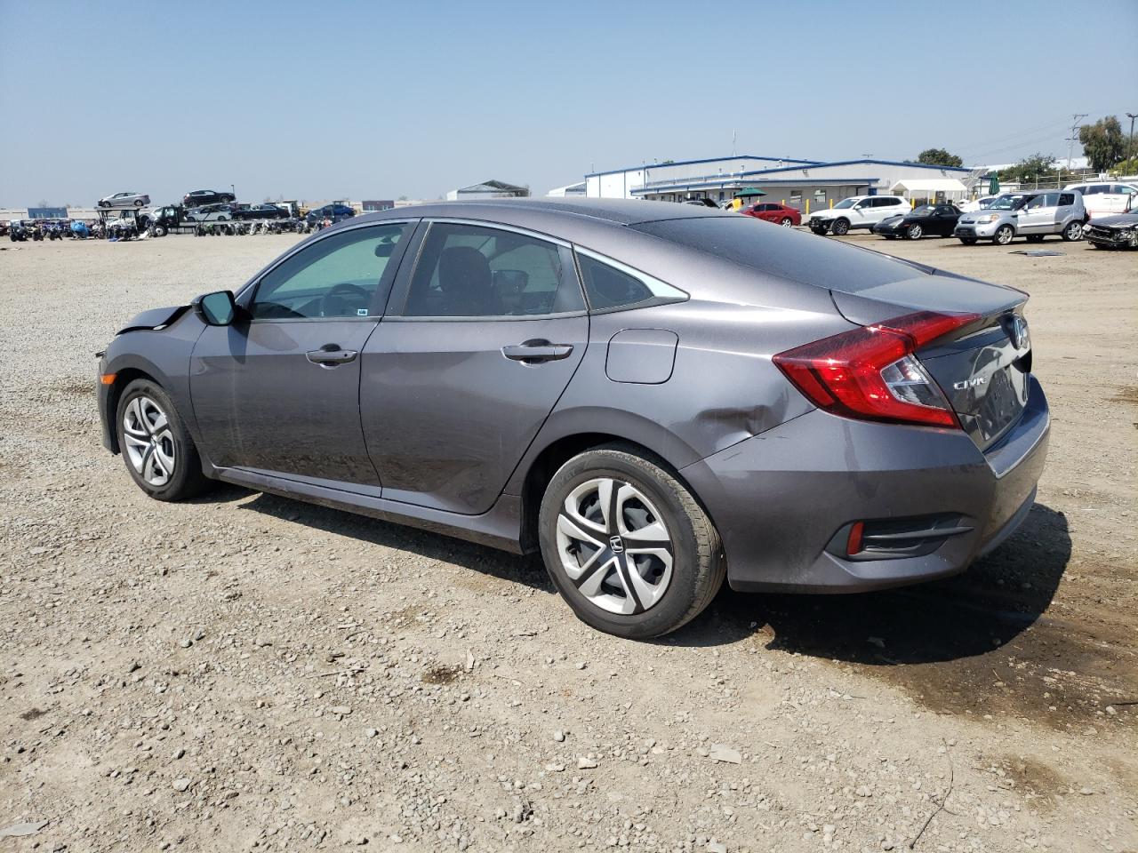 Photo 1 VIN: 2HGFC2F5XHH563890 - HONDA CIVIC 