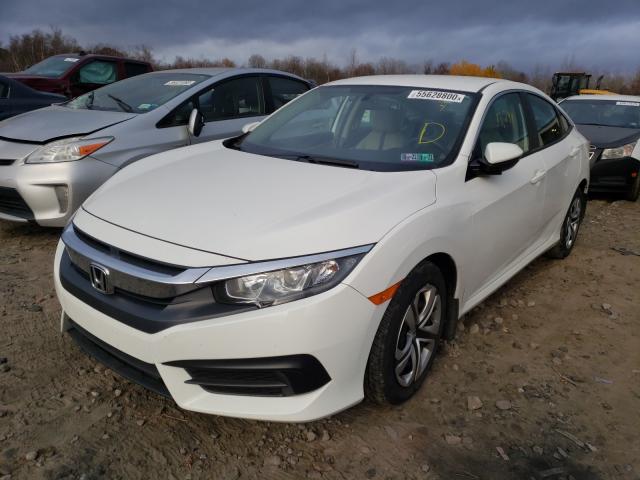 Photo 1 VIN: 2HGFC2F5XHH565591 - HONDA CIVIC LX 