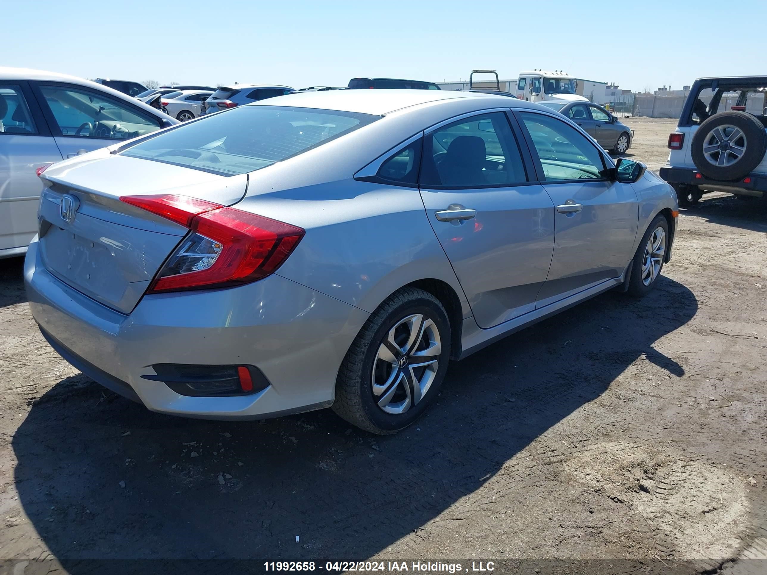 Photo 3 VIN: 2HGFC2F5XJH018858 - HONDA CIVIC 