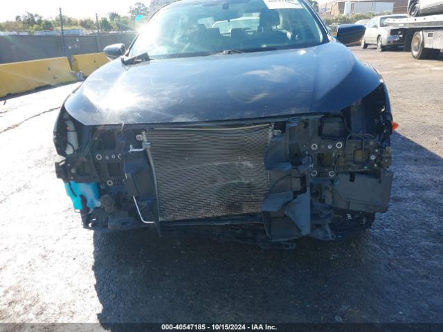 Photo 5 VIN: 2HGFC2F5XJH505042 - HONDA CIVIC 