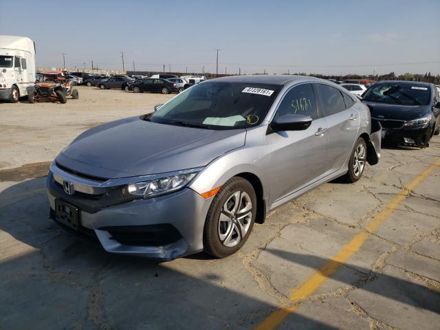 Photo 1 VIN: 2HGFC2F5XJH542673 - HONDA CIVIC LX 